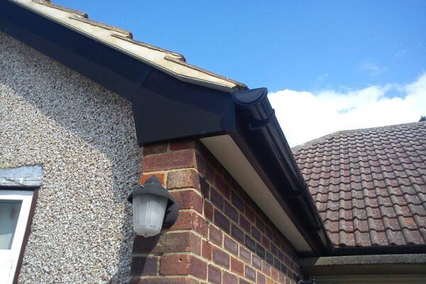 Fascia and bargeboard in black ash with white soffits