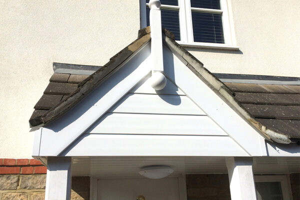 Porch in white with finial, bargeboard & fascia