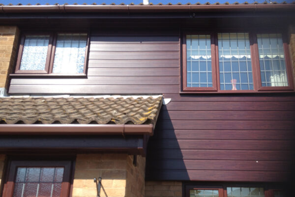 Rosewood cladding with brown guttering