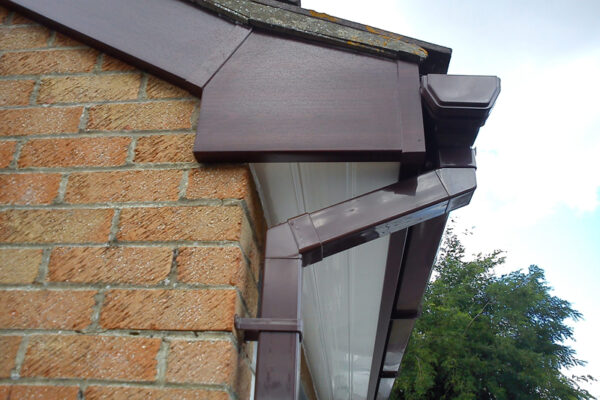 Rosewood fascia, with white soffit and rosewood bargeboards
