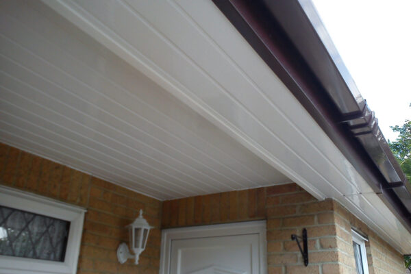 Rosewood fascia, with white soffit in tongue and groove