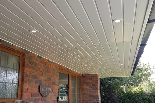 White fascia & soffit and black gutters
